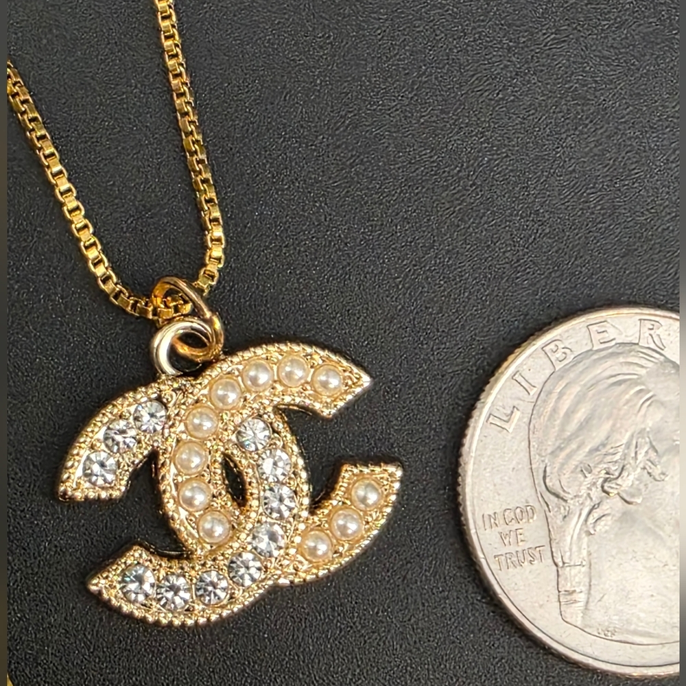 CHANEL Double C Pendant Necklace with Pearl and clear Stones. 18k PVD SS Chain.